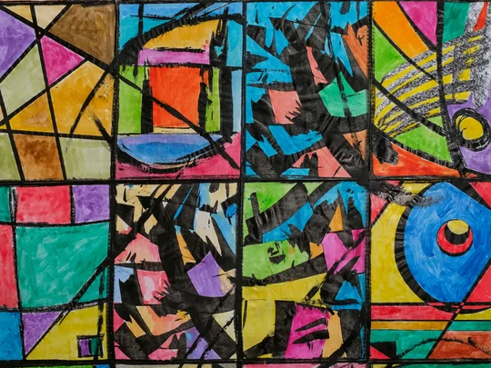 ein großes farbenfrohes Bild, gemalt von Bewohnerinnen und Bewohnern der Hausgemeinchaften St. Augustinus 
